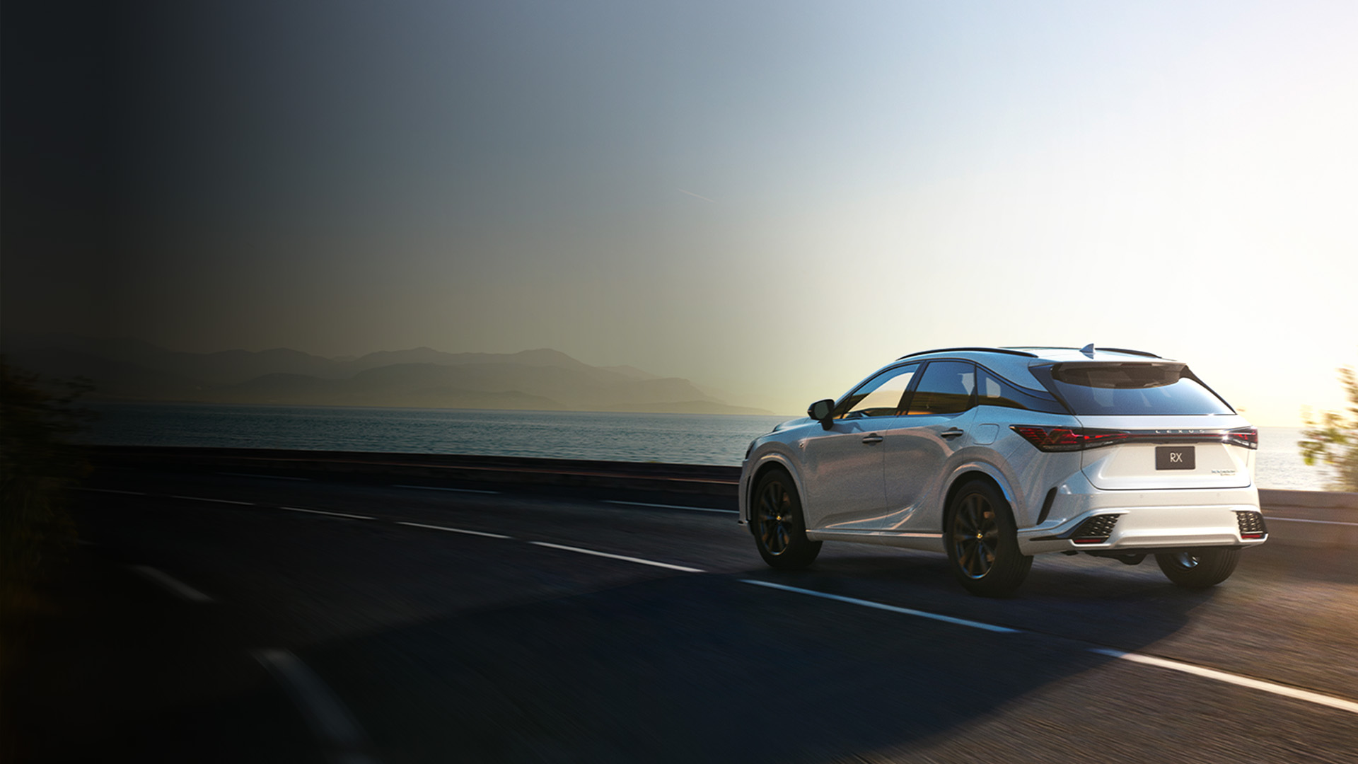 Lexus RX cruising along a road